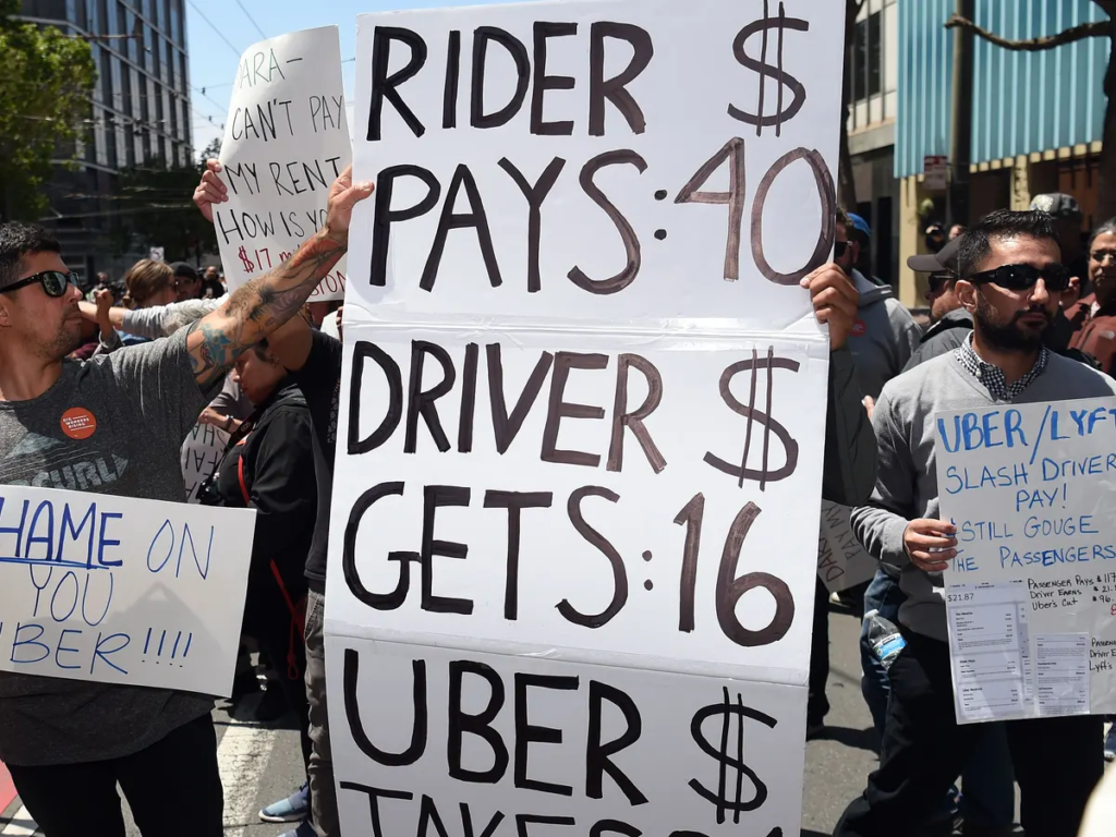 Didelis plakatas proteste prieš Uber