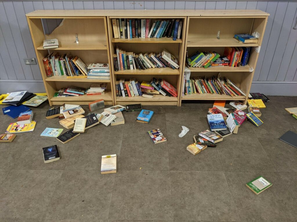 Bookshelf, books around the bookshelf